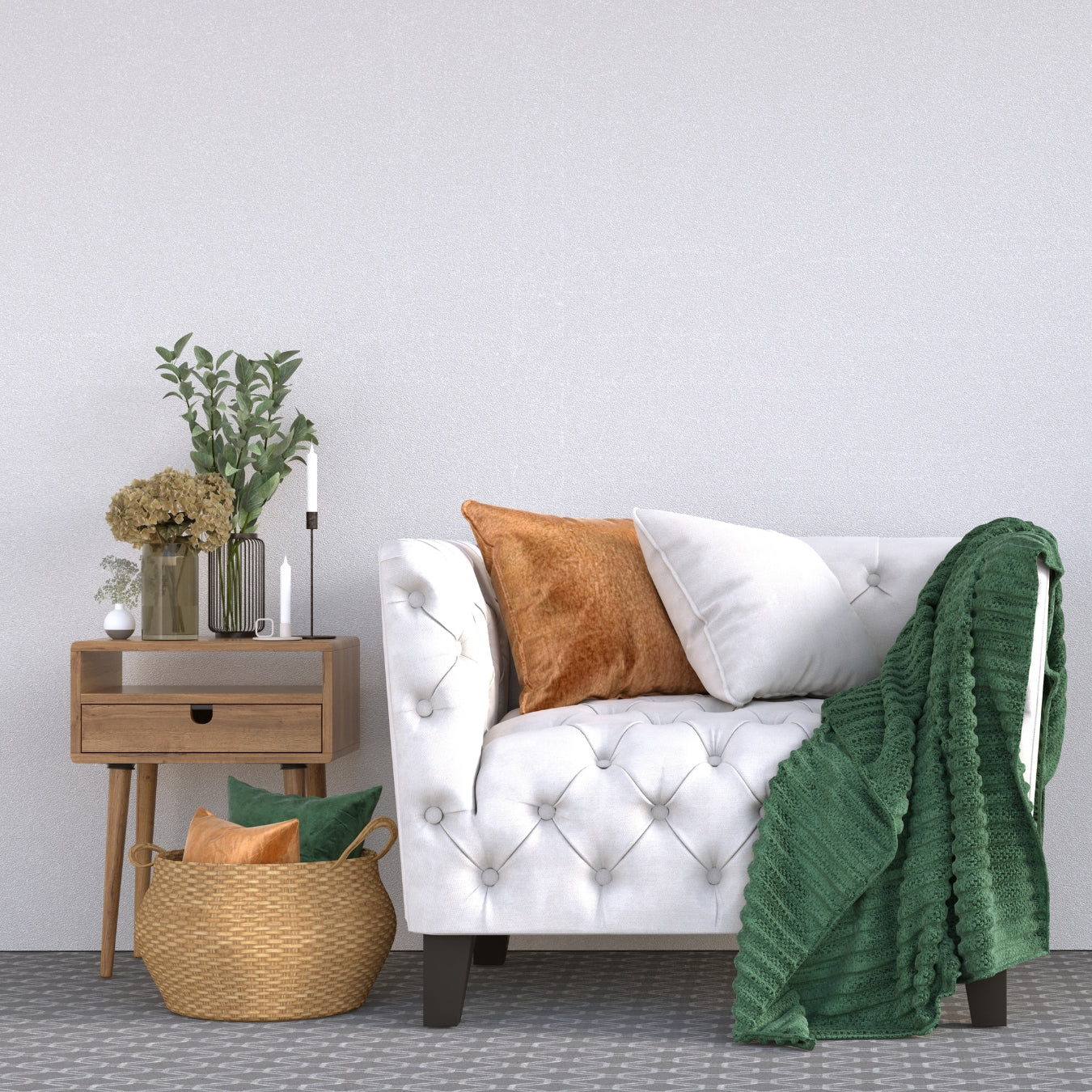 White tufted sofa with decorative pillows and a green blanket in a living room setting.